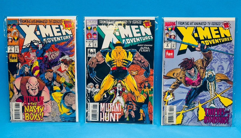 View 1 of 026273…3 X-men comics in plastic sleeves 