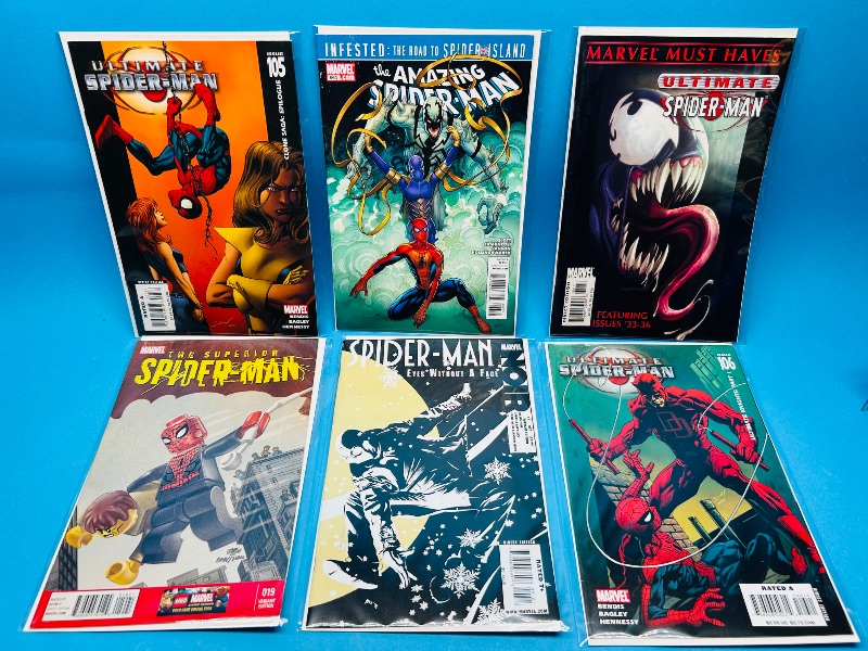 Photo 1 of 026316…6 Spider-Man comics in plastic sleeves 