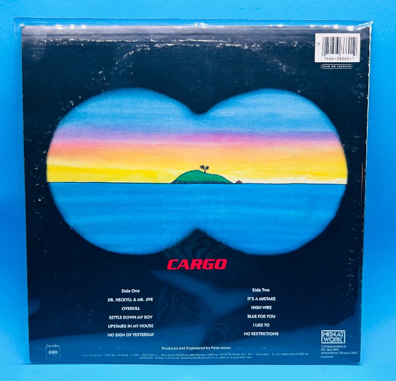 Photo 1 of 026337…Men At Work 33 RPM record in plastic sleeve- record and cover in great condition for age 