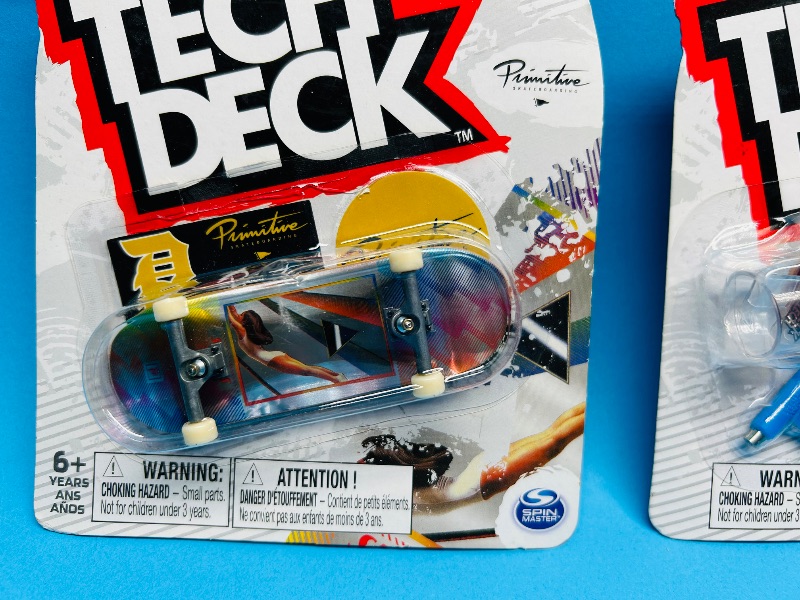 Photo 1 of 026348… 3 Tech Deck fingerboards 