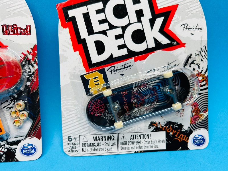 Photo 1 of 026348… 3 Tech Deck fingerboards 