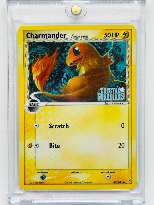 Photo 1 of 026750…Crystal Guardians Charmander Holo Pokémon card in hard plastic case 2006