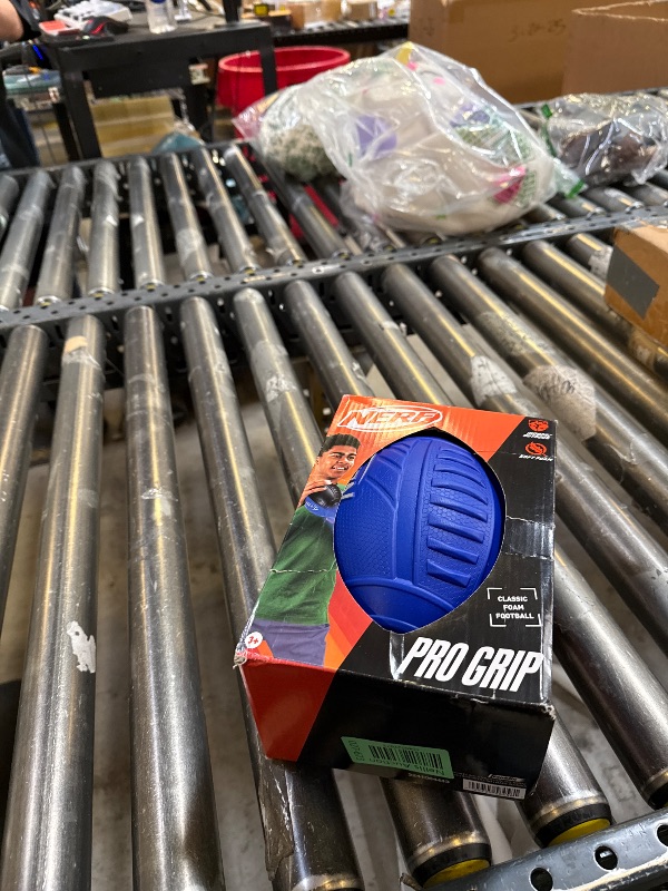 Photo 1 of Nerf Pro Grip Football, Blue, Classic Foam Ball, Easy to Catch & Throw, Balls for Kids, Kids Sports Toys, Perfect Easter Basket Stuffers, Great Easter Toys or Easter Gifts for Kids