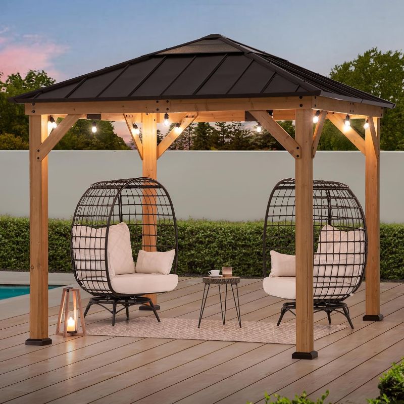 Photo 1 of Sunjoy Hardtop Gazebo 9 x 9 ft. Cedar Framed Wood Gazebo with Brown Steel & Polycarbonate Pyramid Hip Roof and Ceiling Hook for Garden, Backyard Shade, Brown Roof + Natural Wood Frame
