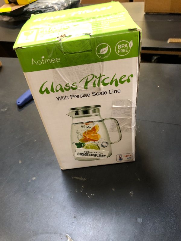 Photo 1 of Aofmee Glass Pitcher, 68oz Water Pitcher with Lid and Precise Scale Line, 18/8 Stainless Steel Iced Tea Carafe, Easy Clean Heat Resistant Borosilicate Jug for Juice, Milk, Cold or Hot Beverages