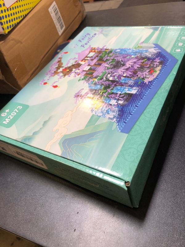 Photo 1 of CAXIMSY Peach Blossom Pond Building Blocks Set,Building Blocks Set Gifts for Adults and Kids, Micro Bricks Cherry Blossom Tree House Kit with LED Light and Display Box?2500+Pieces?