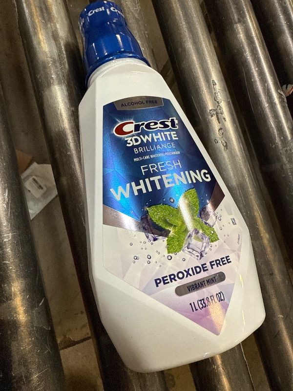 Photo 1 of Crest 3D White Brilliance Alcohol Free Whitening Mouthwash, Clean Mint, 1 L (33.8 fl oz)