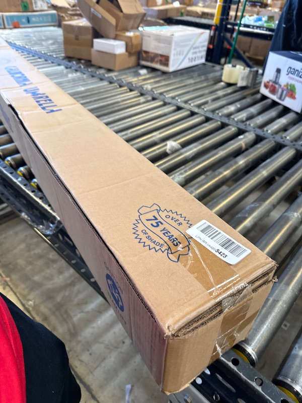 Photo 1 of California Umbrella GSPT908302-5446 9' Round Aluminum Market, Crank Lift, Push Button Tilt, Black Pole, Sunbrella Forest Green Patio Umbrella, 9-Feet