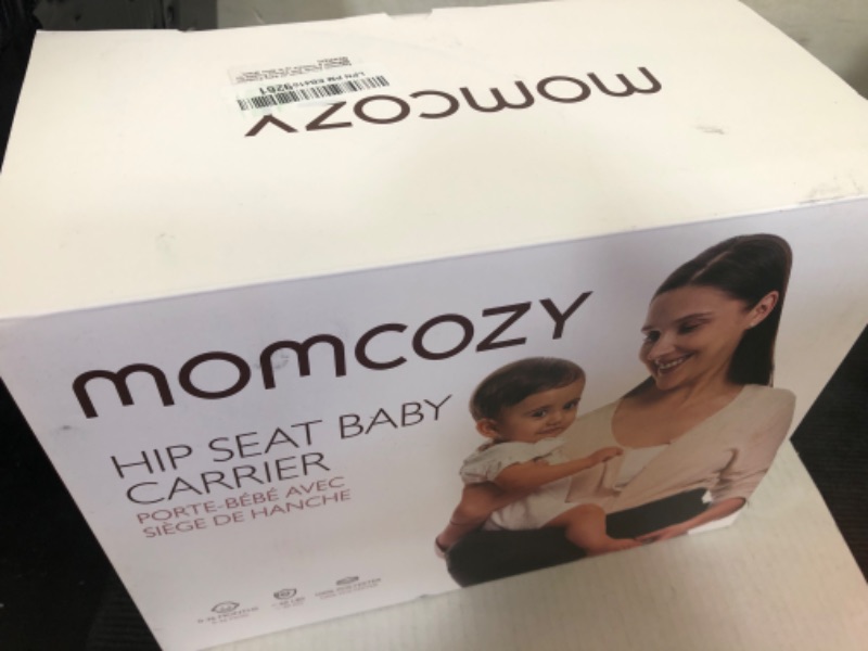 Photo 1 of Momcozy Hip Seat Baby Carrier - Adjustable Waistband with Original 3D Belly Protector, Ergonomic Carrier with Various Pockets for Newborns & Toddlers up to 45lbs (Black, Medium)