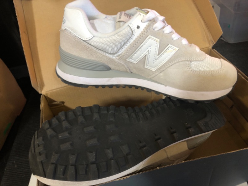 Photo 1 of New Balance Women's 574 Core Sneaker, Nimbus Cloud/White, 8