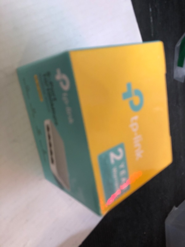 Photo 1 of TP-Link 5 Port 10/100 Mbps Fast Ethernet Switch | Desktop Ethernet Splitter | Ethernet Hub | Plug & Play | Fanless Quiet | Desktop Design | Green Technology | Unmanaged (TL-SF1005D),White
