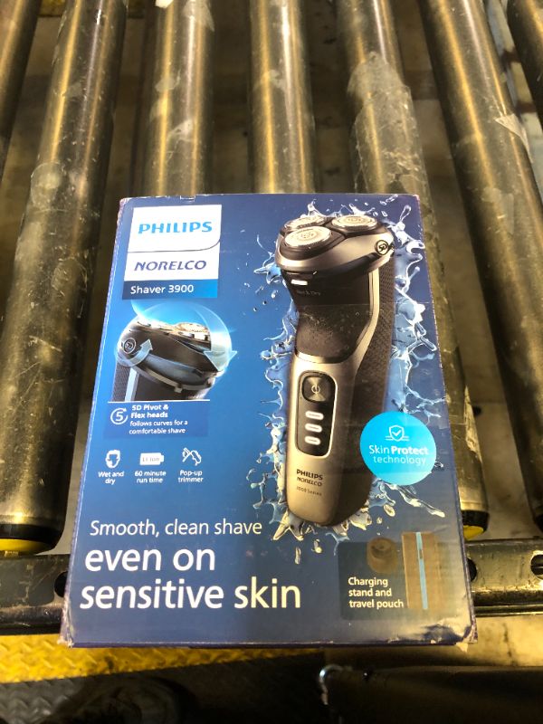 Photo 1 of Philips Norelco Shaver 3900 Series, Wet and Dry Electric Shaver, P-Cap, Travel Pouch, Charging Stand, Storm Blue, Model S3341/92