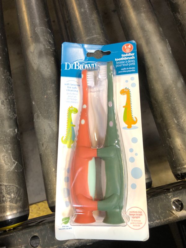 Photo 1 of Dr. Brown's Toddler Toothbrush, Dinosaur, Green and Orange, 2-Pack
