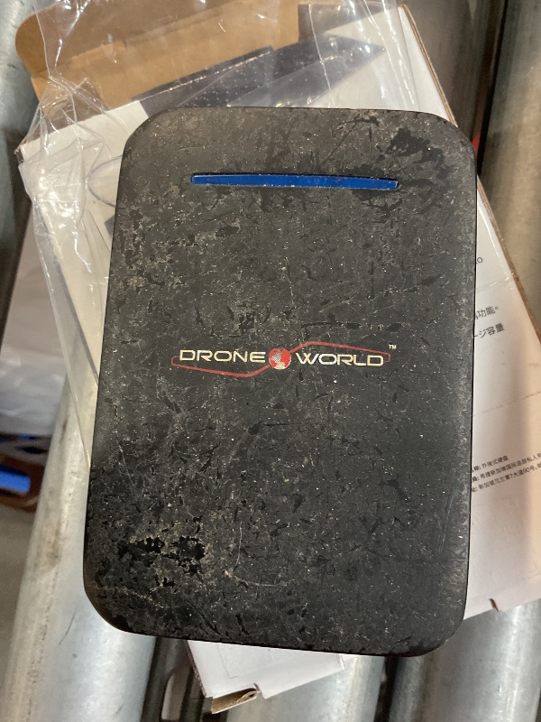 Photo 1 of ***(HEAVILY USED/ MINOR DAMAGE)***Power bank drone world (used)(see images)