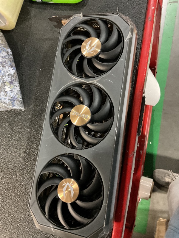 Photo 1 of **PARTS ONLY- NOT FUNCTIONAL** MISSING CORE!!!!
ZOTAC GAMING GEFORCE RTX 5090 AMP EXTREME INFINITY DLSS 4 32GB GDDR7 512-BIT 28 GBPS PCIE 5.0 GAMING GRAPHICS CARD, ICESTORM 3.0 ADVANCED COOLING, SPECTRA 2.0 ARGB LIGHTING, ZT-B50900B-10P
