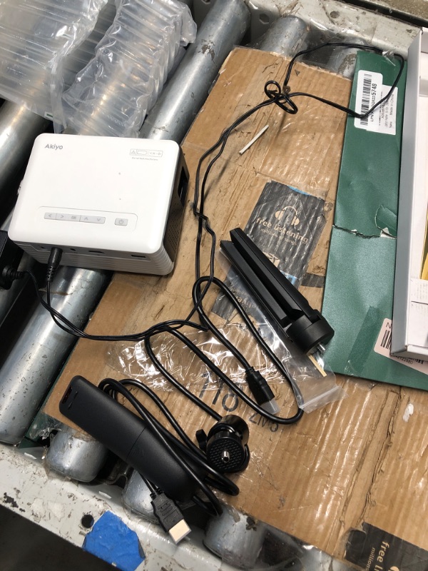 Photo 1 of (USED/FAIR) (POWER TESTED) Mini Projector with WiFi and Bluetooth, AKIYO 1080P Supported Projector with Projector Stand, Portable Movie Projector for Home Theater/Outdoor, Compatible with iOS/Android/Laptop/TV Stick/HDMI/PS5