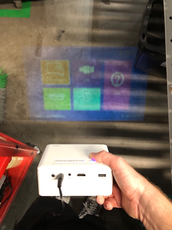 Photo 1 of (USED/FAIR) (POWER TESTED) Mini Projector with WiFi and Bluetooth, AKIYO 1080P Supported Projector with Projector Stand, Portable Movie Projector for Home Theater/Outdoor, Compatible with iOS/Android/Laptop/TV Stick/HDMI/PS5