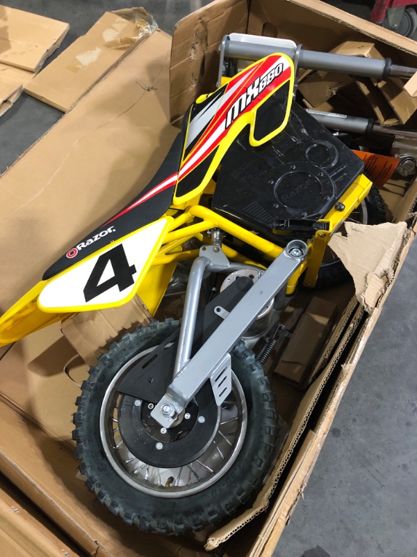 Photo 1 of (please see all images) Razor MX650 Dirt Rocket Electric Motocross Off-road Bike - Yellow