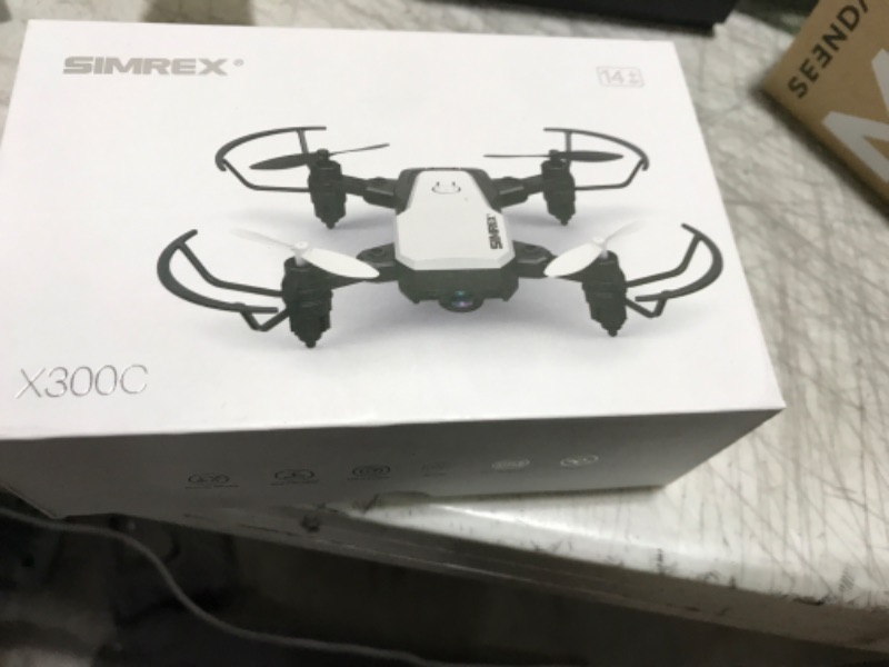 Photo 1 of SIMREX X300C Mini Drone with Camera 720P HD FPV, RC Quadcopter Foldable Drone, Drone With Altitude Hold, 3D Flip, Headless Mode, Gravity Control and 2 Batteries, Gifts for Kids, Adults, Beginner