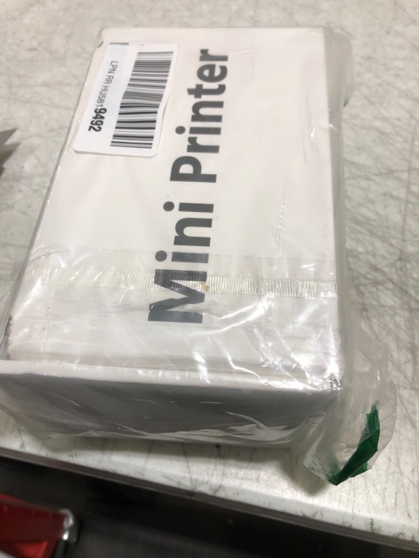 Photo 2 of HXUANJET MINI127 Portable Handheld Inkjet Printer,Mini Handheld Printer with Quick-Drying Ink Pocket Inkjet Coding Machine for Logo/QRcode/Barcode/Production Date/Batch Series Number etc