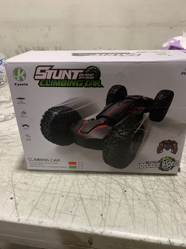 Photo 2 of Kyanio Gesture Sensing RC Stunt Car with Light & Music & Spray - Remote Control Cars for Boys 8-12 Toys, Best Birthday Gift for Kids 6 7 8 9 10 11 12+ Years Old, Cool Hand Controlled Drift Fast RC Car