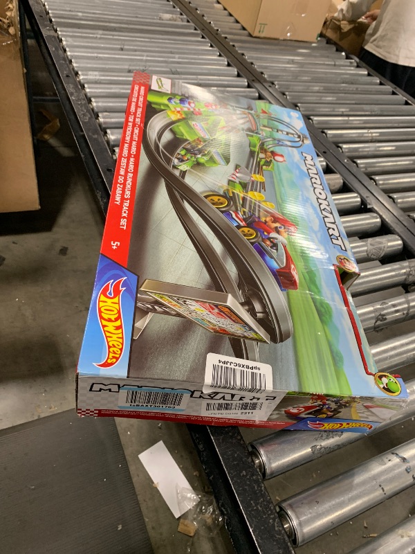 Photo 1 of Hot Wheels Mario Kart Circuit Track Set & 2 Toy Vehicles, Racing Playset Includes Booster, Plus Mario & Yoshi Karts (Amazon Exclusive)