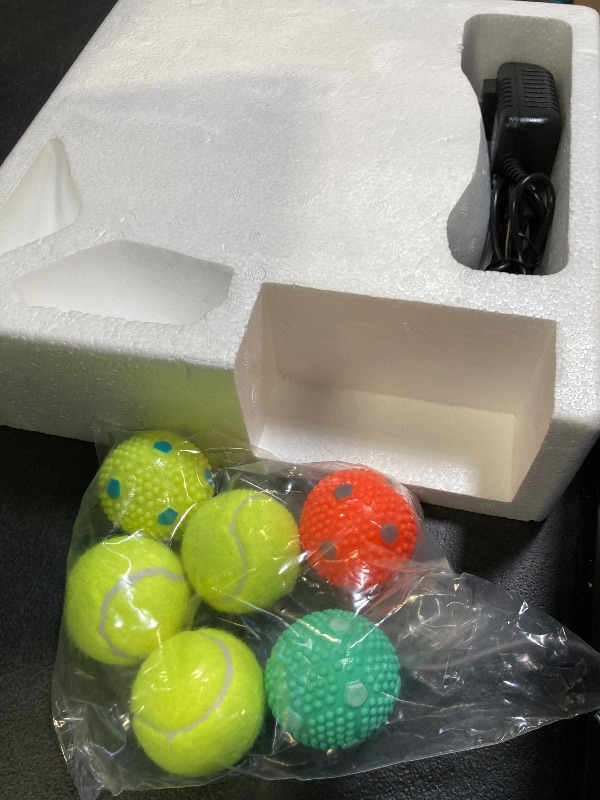 Photo 1 of Automatic Dog Ball Thrower Launcher Dog Fetch Machine for Small to Medium Sized Dogs, Adjustable Launch Distances Ball Launcher with 6 Balls 