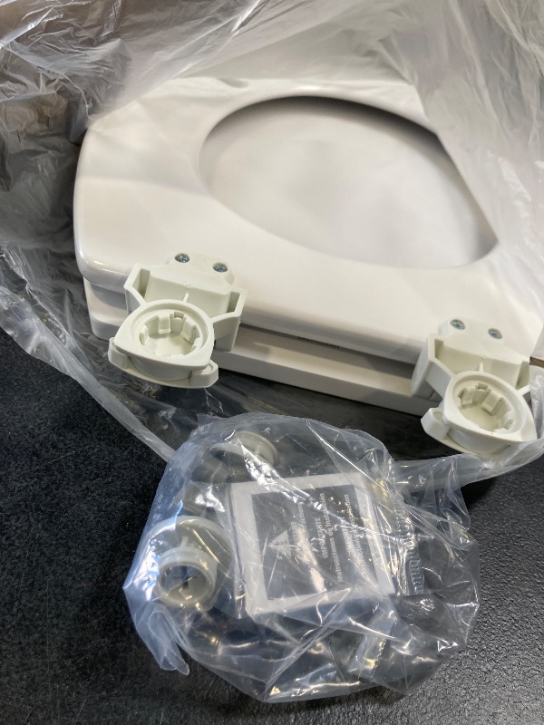 Photo 1 of BEMIS 500EC 390 Toilet Seat with Easy Clean & Change Hinges, 1 Pack Round, Cotton White