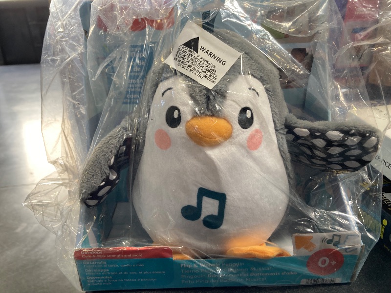 Photo 1 of Fisher-Price Baby Tummy Time Toy Flap & Wobble Penguin, Plush with Music & Motion for Sensory Play Newborns Ages 0+ Months