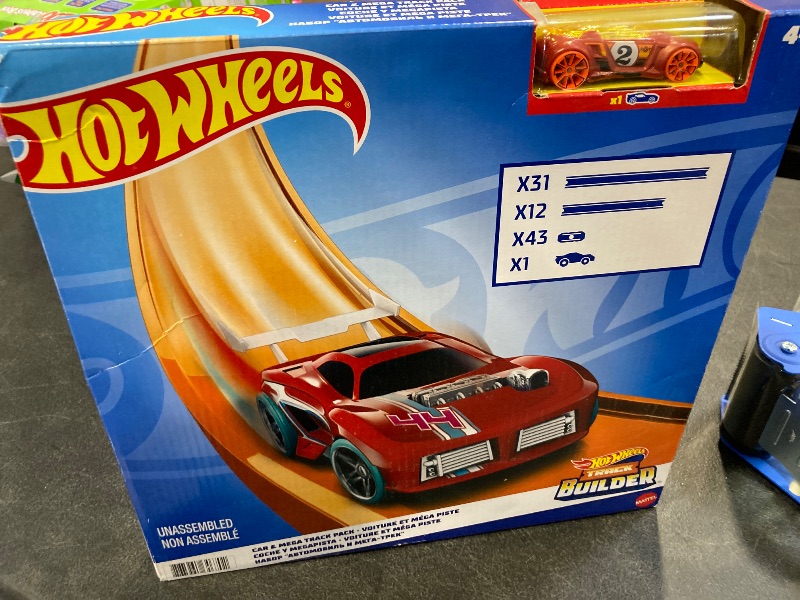 Photo 1 of Hot Wheels Toy Car Mega Track Set Pack, 87 Component Building Parts for 40-ft of Track & 1:64 Scale Vehicle (Amazon Exclusive)