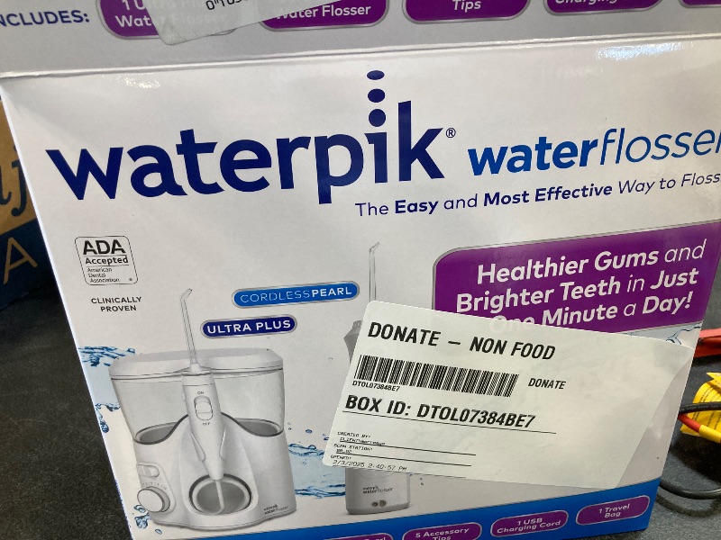 Photo 1 of Waterpik Ultra Plus and Cordless Pearl Water Flosser Combo Pack