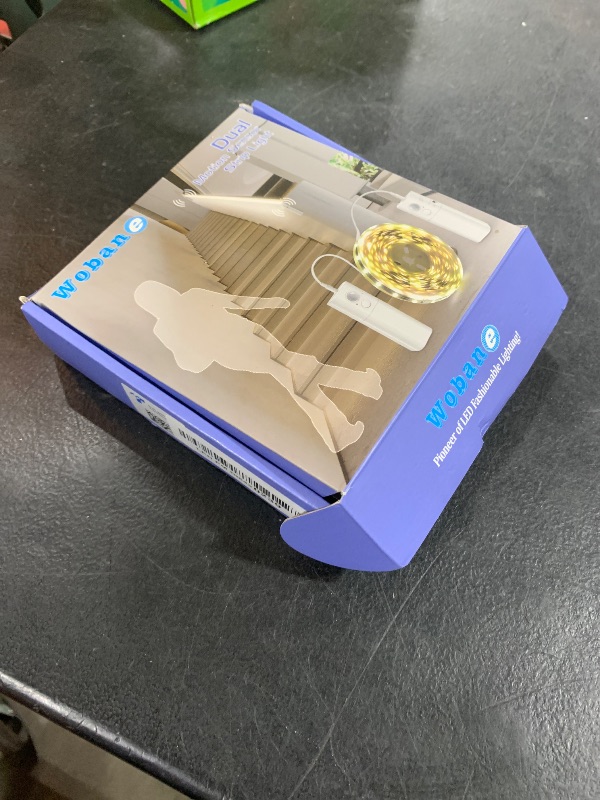 Photo 1 of WOBANE Dual Motion Sensor Stair Light Strip, Rechargeable 16.4ft LED Strip Light,150 LEDs Cuttable Tape Light for Hallway,Under Cabinet,Cupboard,Shelves,Gun Safe Light,Flexible,6000K White