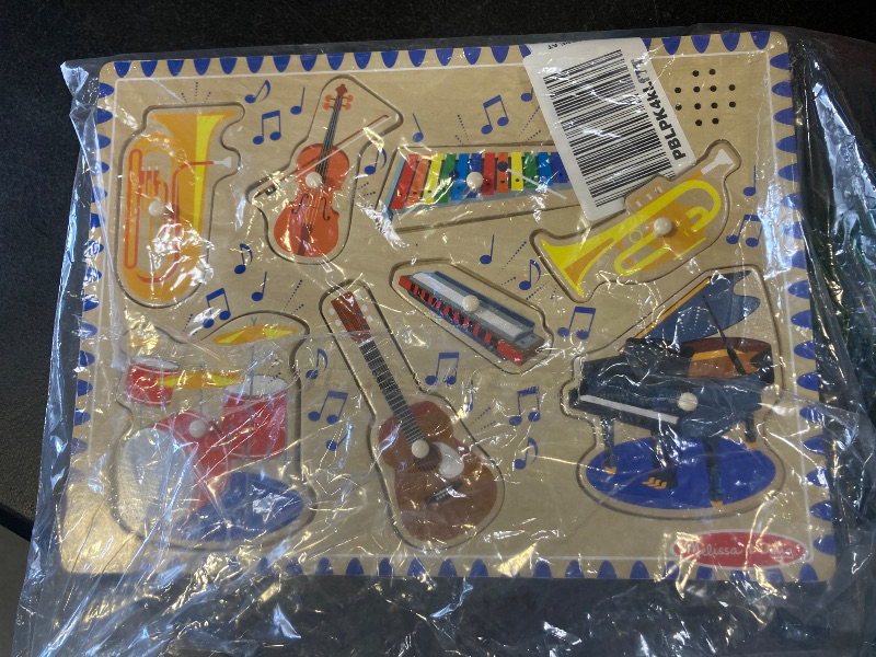 Photo 1 of Melissa & Doug Musical Instruments Sound Puzzle - Wooden Peg Puzzle with Light-Activated Sound Effects (8 pcs) Wooden Peg Baby Music Learning Toys, For Toddlers And Preschoolers Ages 2+