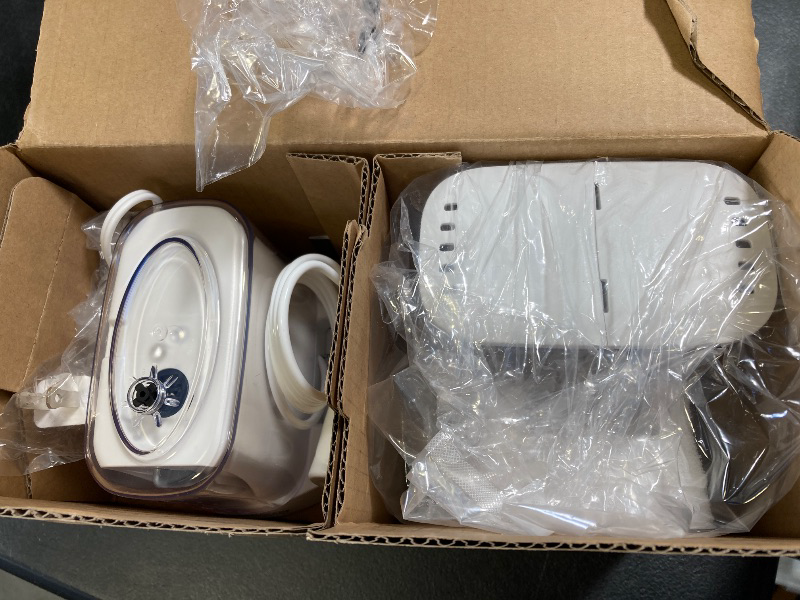 Photo 1 of Waterpik Evolution and Nano Water Flosser Combo Pack