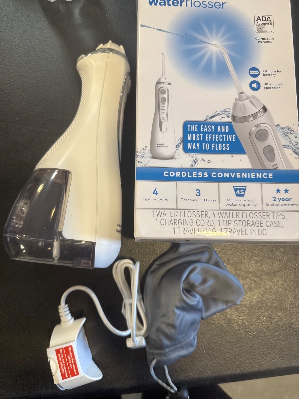Photo 1 of Waterpik Cordless Advanced 2.0 Water Flosser For Teeth, Gums, Braces, Dental Care With Travel Bag and 4 Tips, ADA Accepted, Rechargeable, Portable, and Waterproof, White WP-580, Packaging May Vary