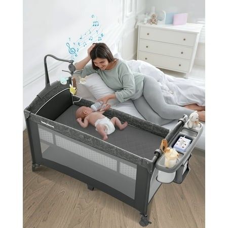 Photo 1 of 5 in 1 Baby Bassinet Bedside Sleeper Rocking Bassinet for Baby Easy Folding Portable Playards Pack and Play with Mattress Diaper Changer and Music
