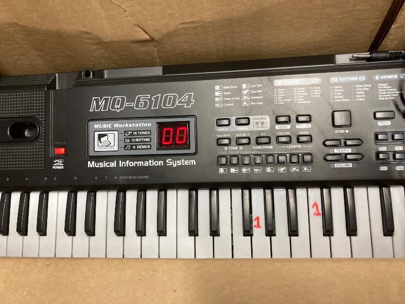 Photo 1 of 61 Keys Electronic Keyboard Piano with Microphone for Kids Adults Beginners Music Keyboard Portable painted on numbers picture is taken