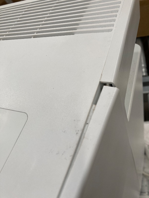 Photo 1 of  ***(NOT IN ORIGINAL BOX, BOX RIPPED/TORN, SOME SCUFFS/SCRATCHES, FRONT TOP FRAME CRACKED...SEE PHOTOS)***
Frigidaire 60-Pint Portable Dehumidifier with Built-In Pump for Large Rooms & Basements, Custom Humidity Control, Auto Shut Off, White   ***(NOT IN 