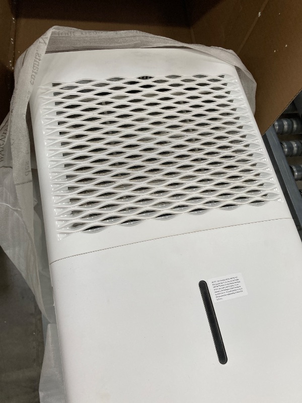 Photo 1 of  ***(NOT IN ORIGINAL BOX, BOX RIPPED/TORN, SOME SCUFFS/SCRATCHES, FRONT TOP FRAME CRACKED...SEE PHOTOS)***
Frigidaire 60-Pint Portable Dehumidifier with Built-In Pump for Large Rooms & Basements, Custom Humidity Control, Auto Shut Off, White   ***(NOT IN 
