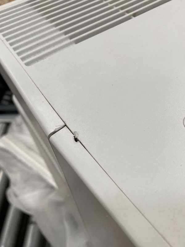 Photo 1 of  ***(NOT IN ORIGINAL BOX, BOX RIPPED/TORN, SOME SCUFFS/SCRATCHES, FRONT TOP FRAME CRACKED...SEE PHOTOS)***
Frigidaire 60-Pint Portable Dehumidifier with Built-In Pump for Large Rooms & Basements, Custom Humidity Control, Auto Shut Off, White   ***(NOT IN 