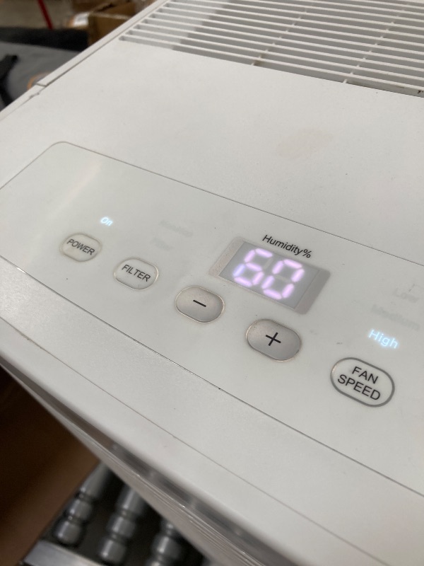 Photo 1 of  ***(NOT IN ORIGINAL BOX, BOX RIPPED/TORN, SOME SCUFFS/SCRATCHES, FRONT TOP FRAME CRACKED...SEE PHOTOS)***
Frigidaire 60-Pint Portable Dehumidifier with Built-In Pump for Large Rooms & Basements, Custom Humidity Control, Auto Shut Off, White   ***(NOT IN 