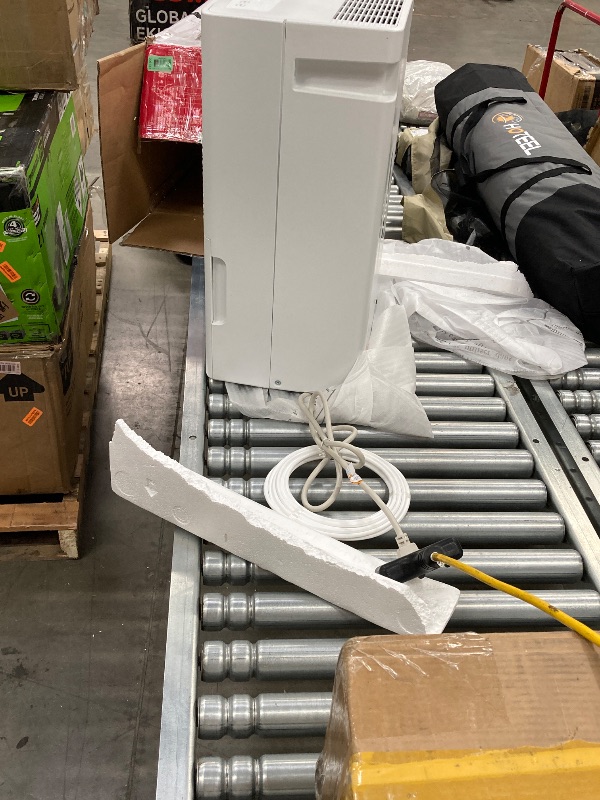 Photo 1 of  ***(NOT IN ORIGINAL BOX, BOX RIPPED/TORN, SOME SCUFFS/SCRATCHES, FRONT TOP FRAME CRACKED...SEE PHOTOS)***
Frigidaire 60-Pint Portable Dehumidifier with Built-In Pump for Large Rooms & Basements, Custom Humidity Control, Auto Shut Off, White   ***(NOT IN 