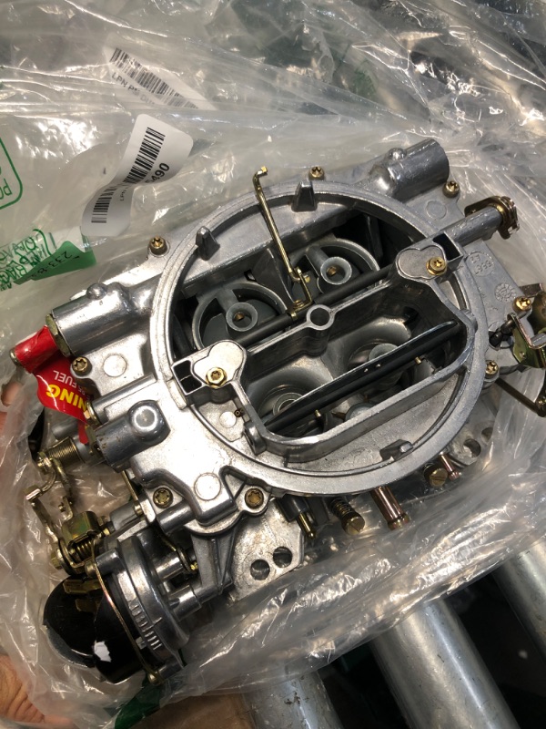 Photo 1 of **MAJOR DAMAGE SEE PHOTO**PARTS ONLY**
Edelbrock 9906 Performer 600 CFM Vacuum Secondary Electric Choke Remanufactured Carburetor (Renewed)
