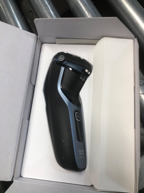 Photo 1 of Philips Norelco Shaver 3600 Series, Wet and Dry Electric Shaver, P-Cap, Travel Pouch, Storm Blue, Model S3243/91