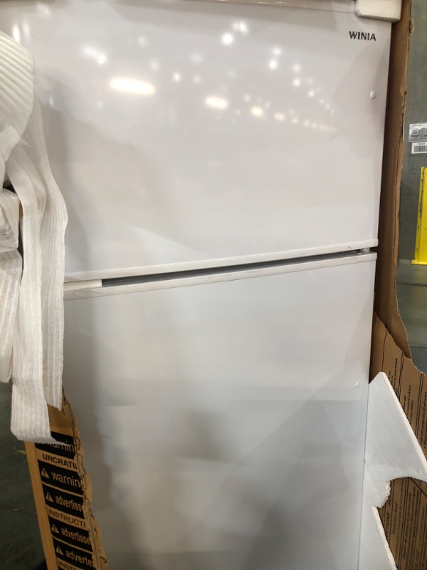 Photo 1 of *** FACTORY SEAL******TRUCK OR TRAILER PICK UP ONLY***Winia WTE21GSWCD 21 Cu. Ft. Top Mount Refrigerator - White