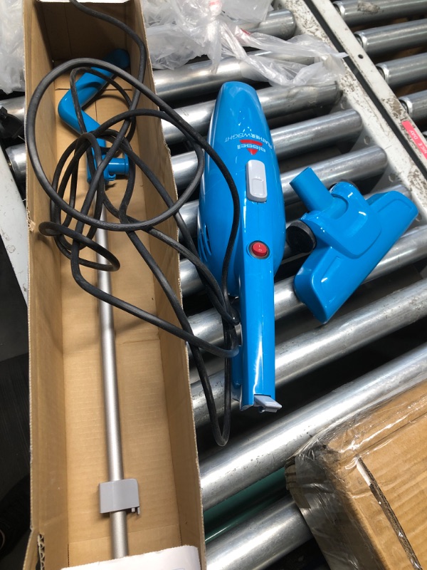 Photo 1 of **DUSTY, TURNS ON** Bissell Featherweight Stick Lightweight Bagless Vacuum with Crevice Tool, 2033, One Size Fits All, Blue