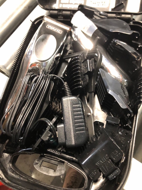 Photo 1 of **TURNS ON, SOME HAIR, SOME OIL** Wahl Clipper Cordless Chrome Pro Hair Clippers for Men and Battery Hair Trimmer Combo for Full Haircuts and Touch-Up Trims – Model 3026590