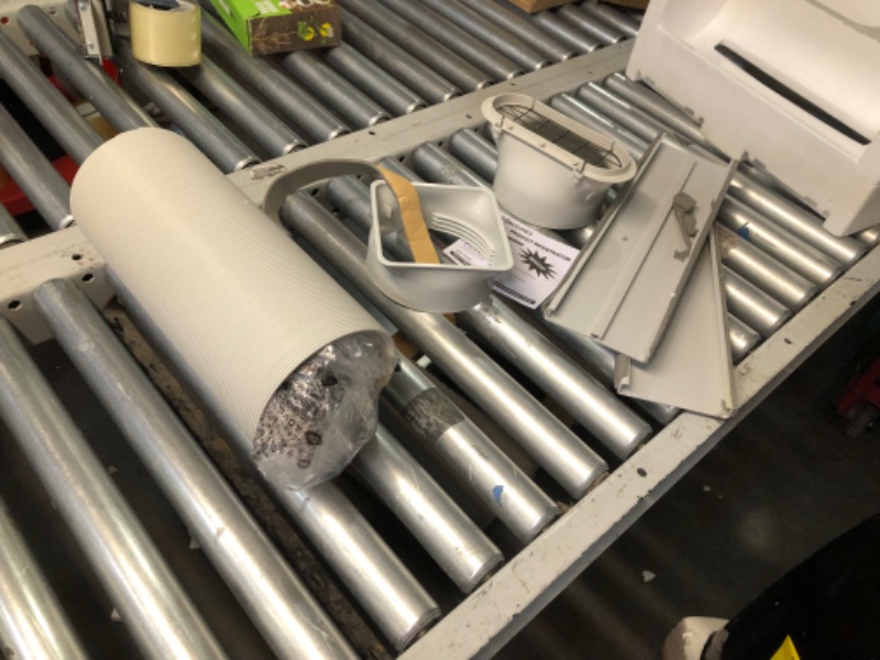 Photo 1 of ***USED - LIGHTS UP WHEN PLUGGED IN, BUT FAN DOESN'T BLOW - UNABLE TO TROUBLESHOOT - SEE PICTURES - LIKELY MISSING PARTS***
LG 10,000 BTU Smart Portable Air Conditioner, 115V, Cools 450 Sq.Ft. (18' x 25' Room Size), Portable Air Conditioner for Home with 