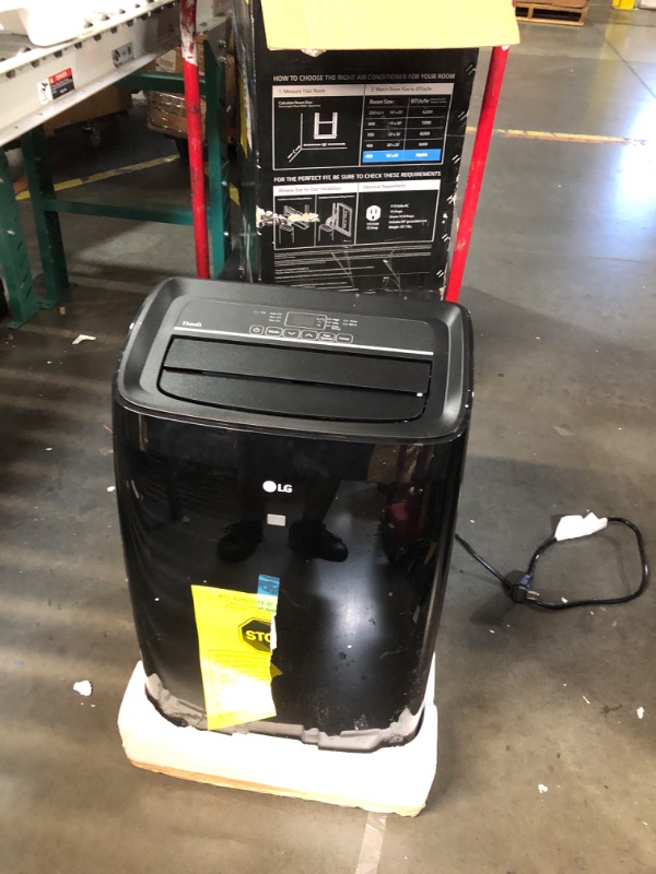 Photo 1 of ***USED - LIGHTS UP WHEN PLUGGED IN, BUT FAN DOESN'T BLOW - UNABLE TO TROUBLESHOOT - SEE PICTURES - LIKELY MISSING PARTS***
LG 10,000 BTU Smart Portable Air Conditioner, 115V, Cools 450 Sq.Ft. (18' x 25' Room Size), Portable Air Conditioner for Home with 