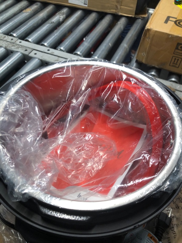 Photo 1 of Instant Pot Pro 10-in-1 Pressure Cooker, Slow Cooker, Rice/Grain Cooker, Steamer, Sauté, Sous Vide, Yogurt Maker, Sterilizer, and Warmer, Includes App With Over 800 Recipes, Black, 6 Quart